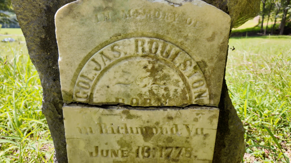The broken and weathered headstones of Colonel James Roulston (aka Raulston).